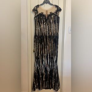 Short sleeve long black dress with gold and silver embellishments